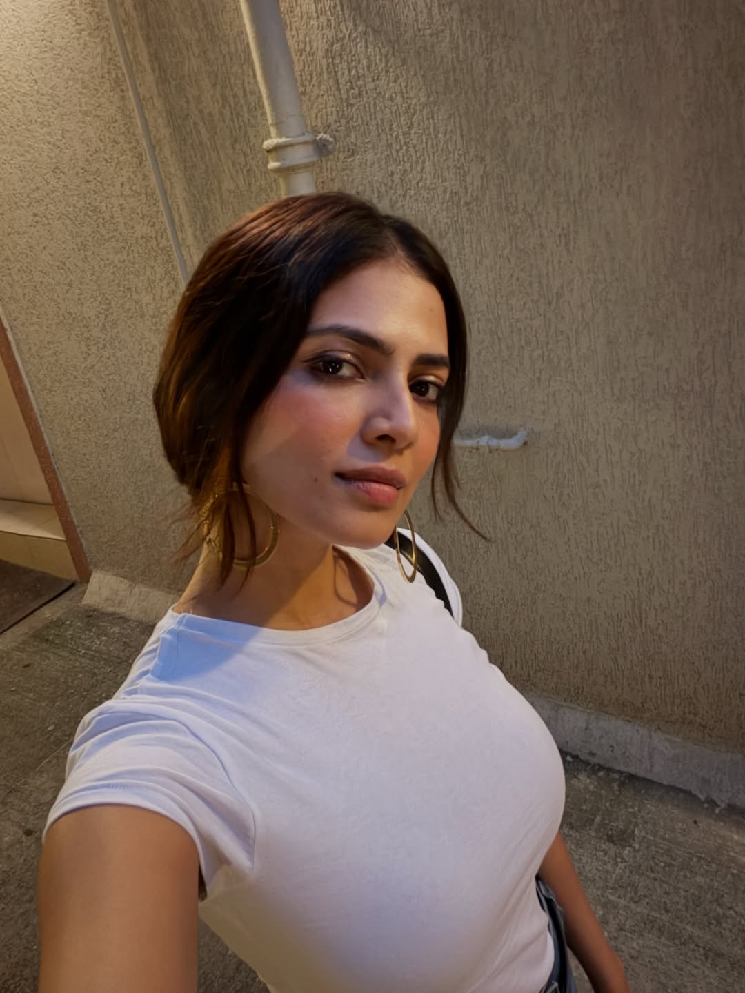 Malavika Mohanan Turns Heads With Her Stunning Maroon Look