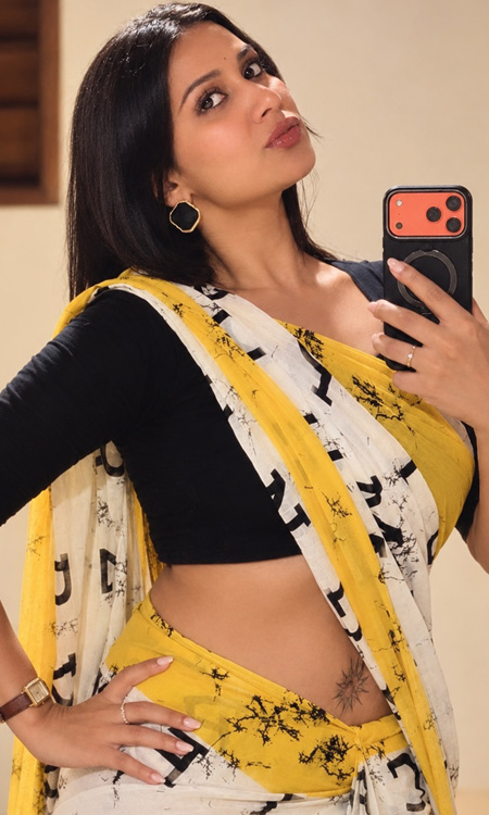 Doulath Sulthana Stuns in Stylish Yellow Saree With Bold Tattoo Look