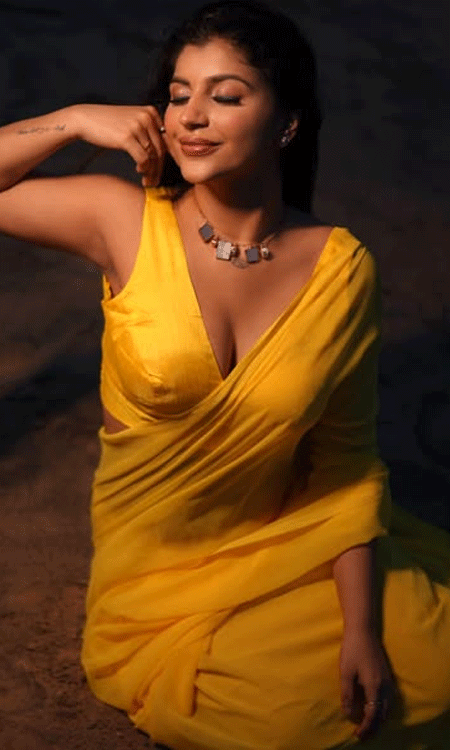 Yashika Aannand Stuns In A Vibrant Yellow Saree At Golden Hour