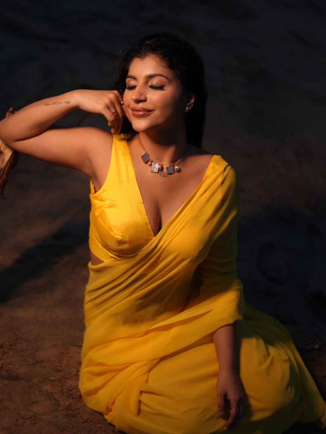 Yashika Aannand Stuns In A Vibrant Yellow Saree At Golden Hour