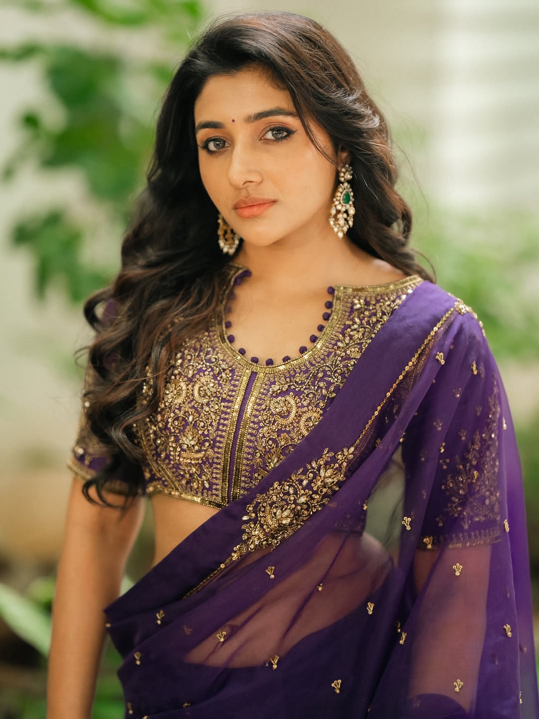 Mirnaa Stuns in Purple Saree With Regal Traditional Look