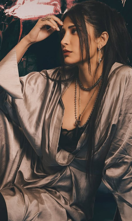 Shruti Haasan Blends Glamour With Dark Elegance