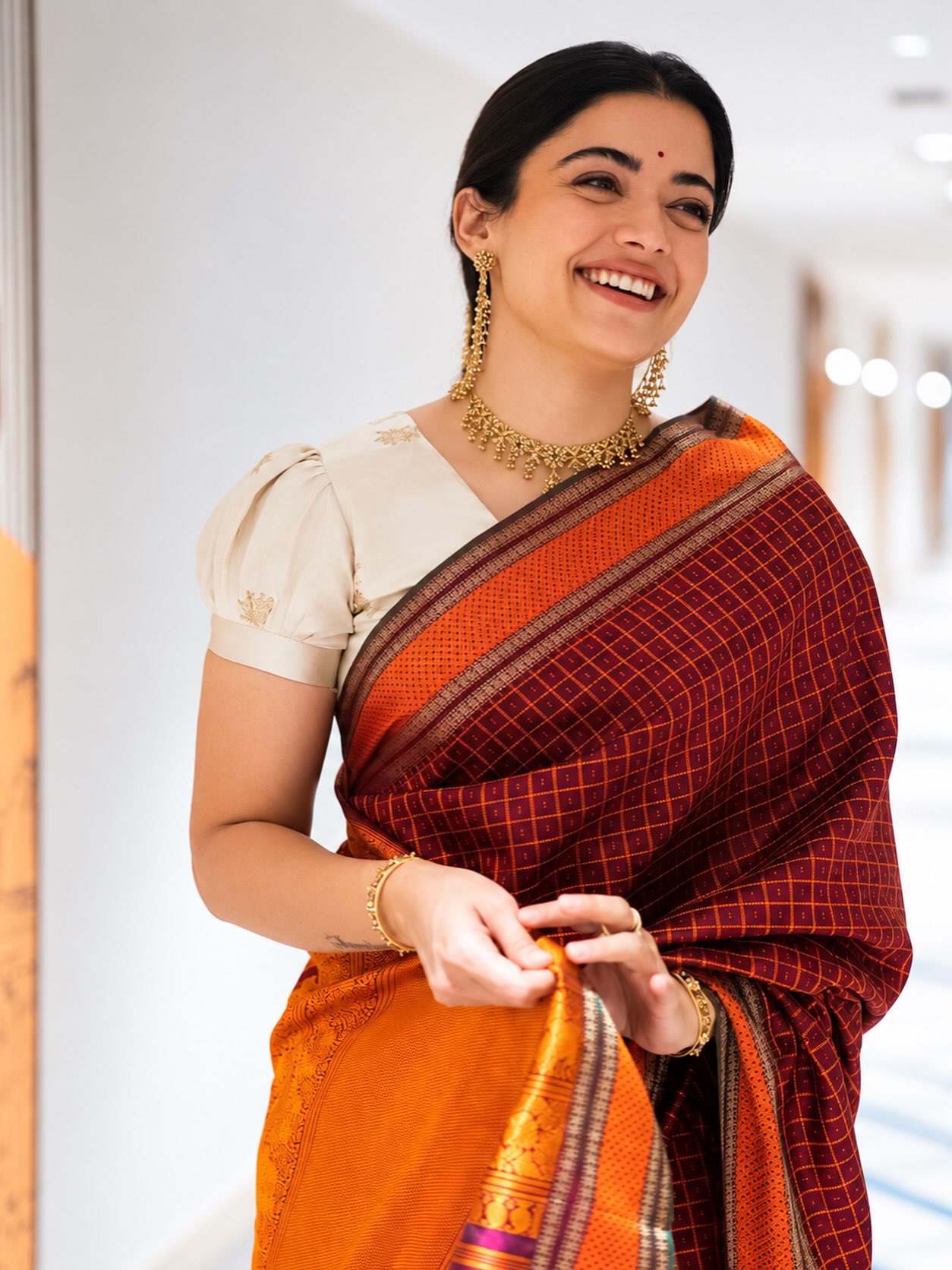 Rashmika Mandanna Radiates Traditional Elegance in a Striking Maroon Saree