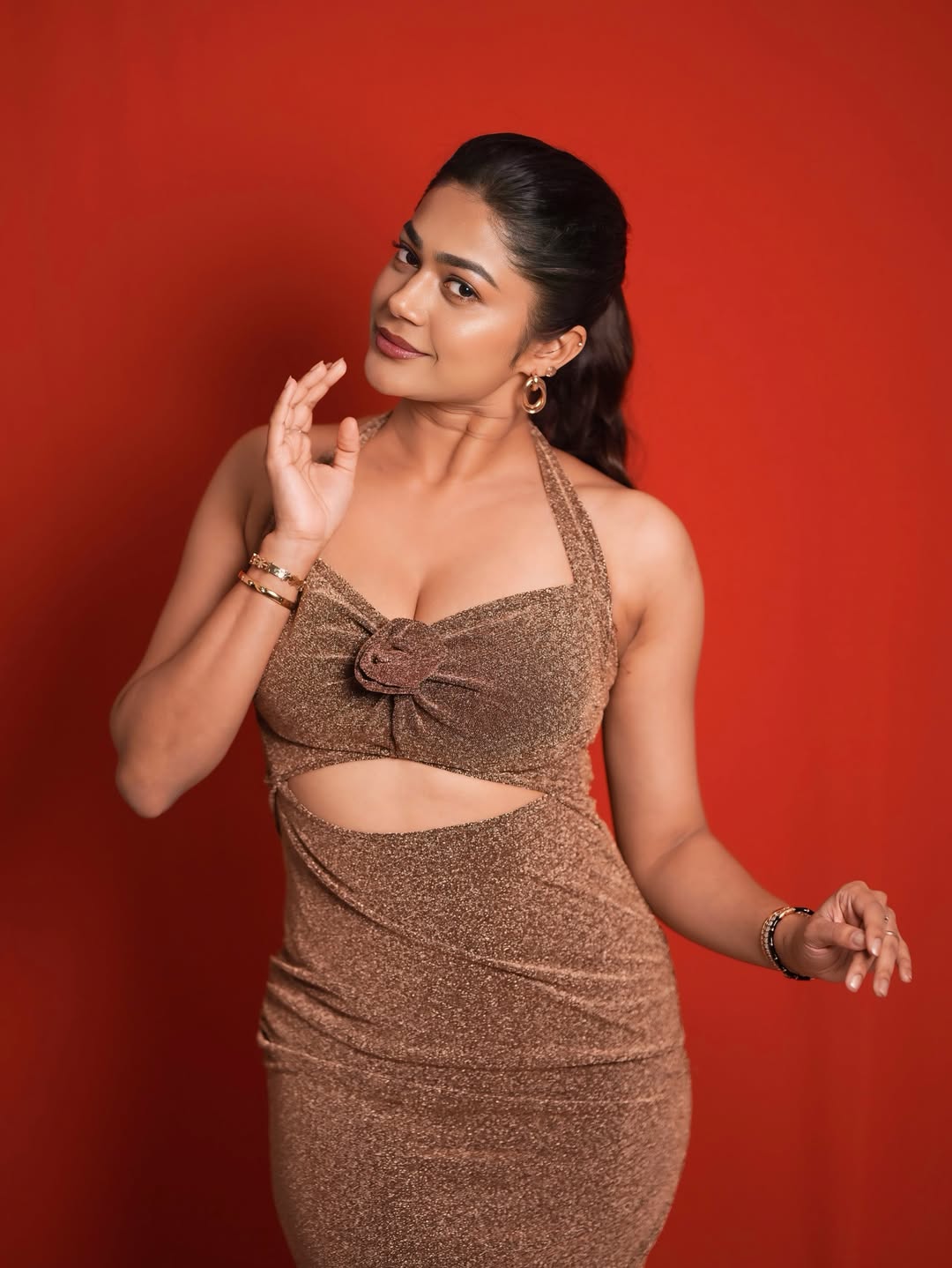 Payal Radhakrishna Turns Up the Heat in a Dazzling Bronze Halter Dress