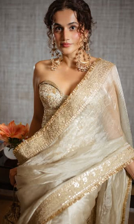 Taapsee Pannu Stuns in an Ivory Organza Saree With Regal Elegance
