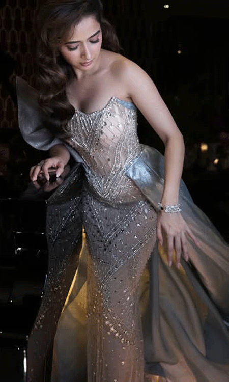 Ashika Ranganath Stuns in an Ethereal Sheer Gown by the Grand Piano