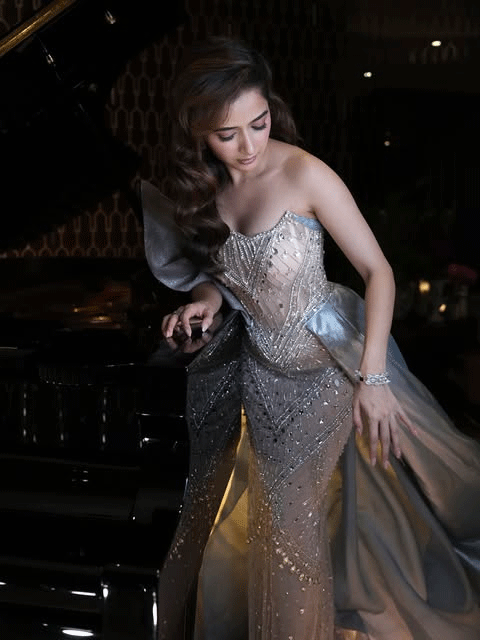 Ashika Ranganath Stuns in an Ethereal Sheer Gown by the Grand Piano