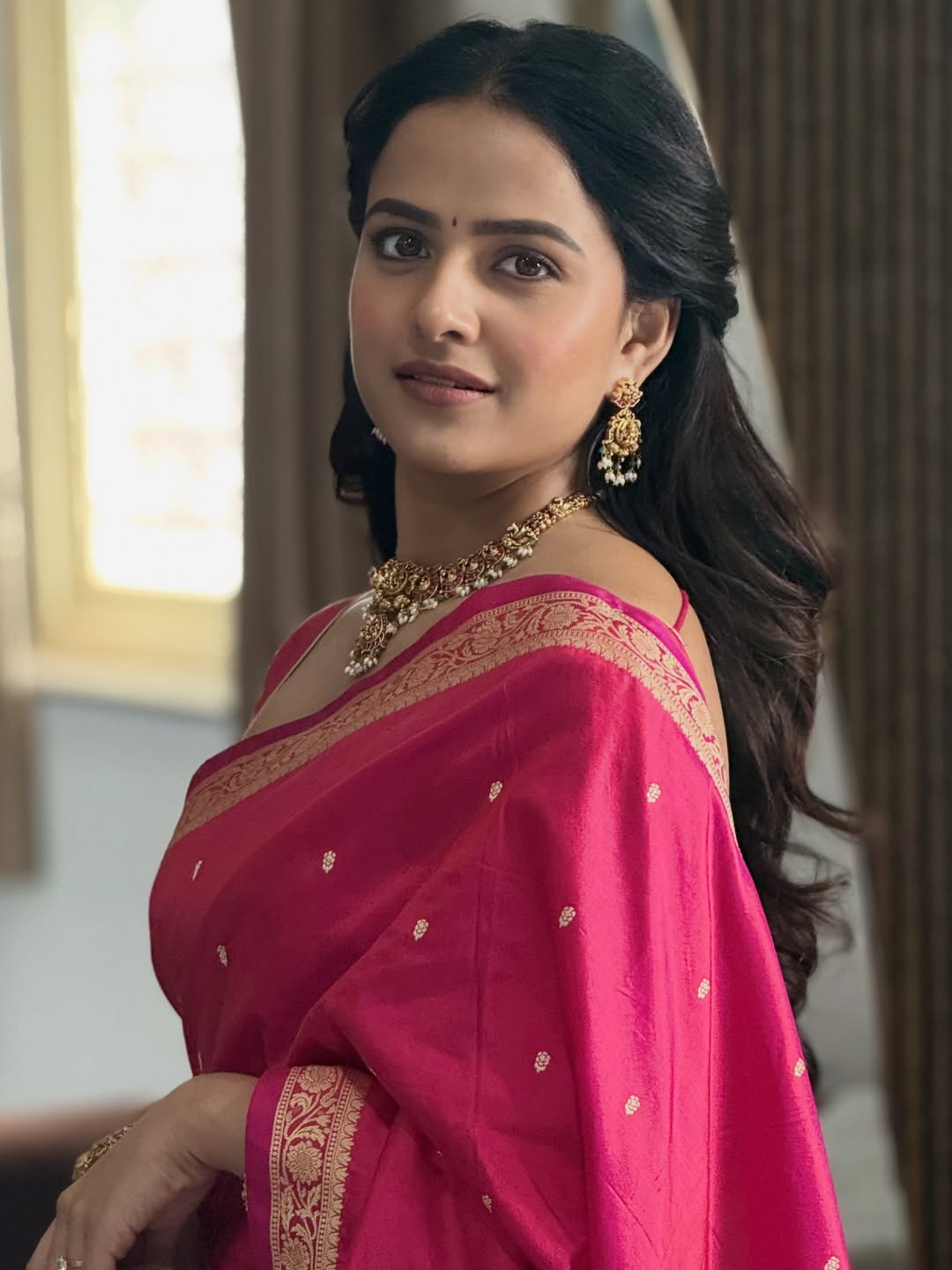 Vaishnavi Chaitanya Turns Heads in a Vibrant Pink Saree