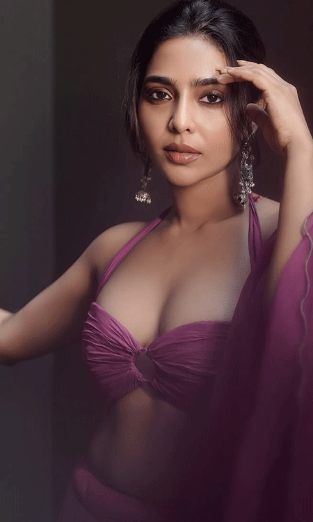 Aishwarya Lekshmi Stuns in a Glamorous Magenta Outfit