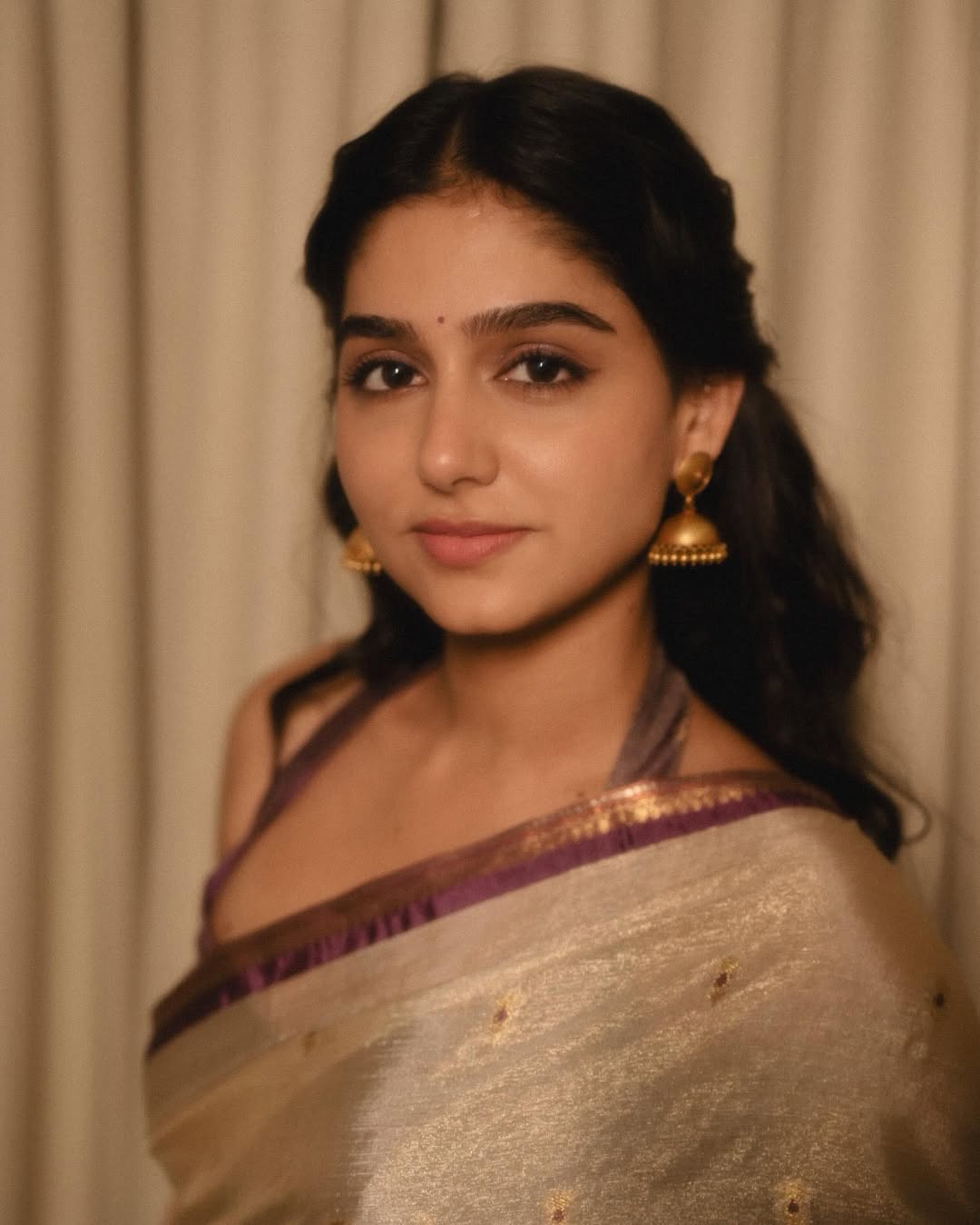 Anaswara Rajan Stuns in a Traditional Gold Saree Look