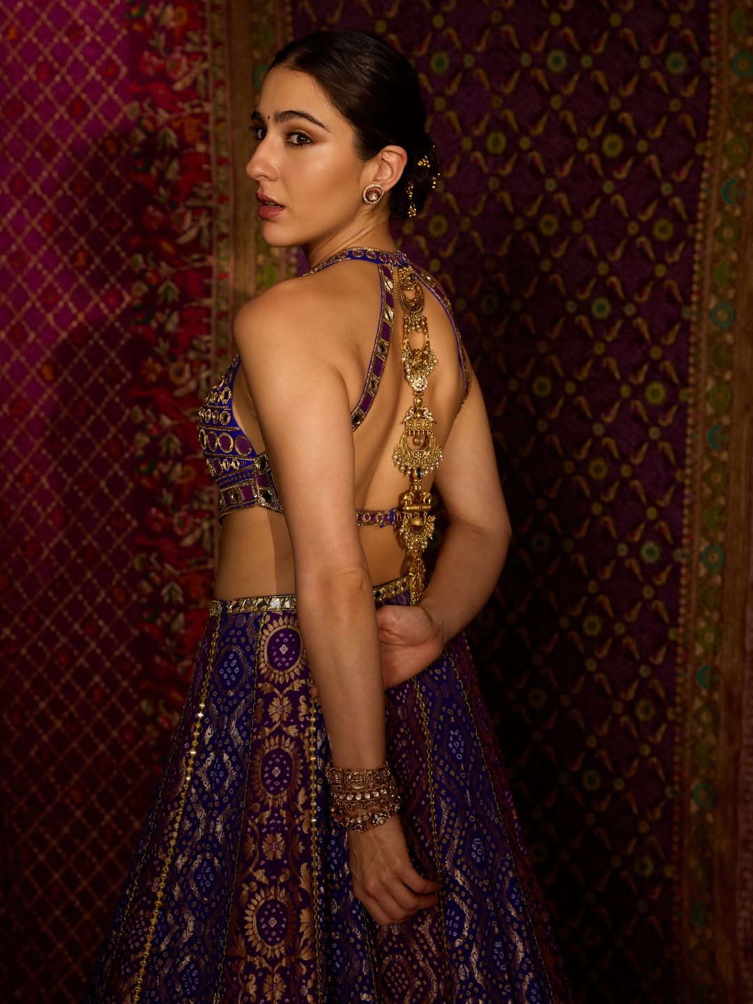 Sara Ali Khan Stuns in Purple and Gold Lehenga for Navratri