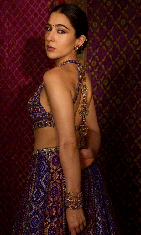 Sara Ali Khan Stuns in Purple and Gold Lehenga for Navratri