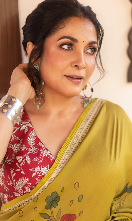 Ramya Krishnan Looks Elegant in a Mustard Yellow Saree