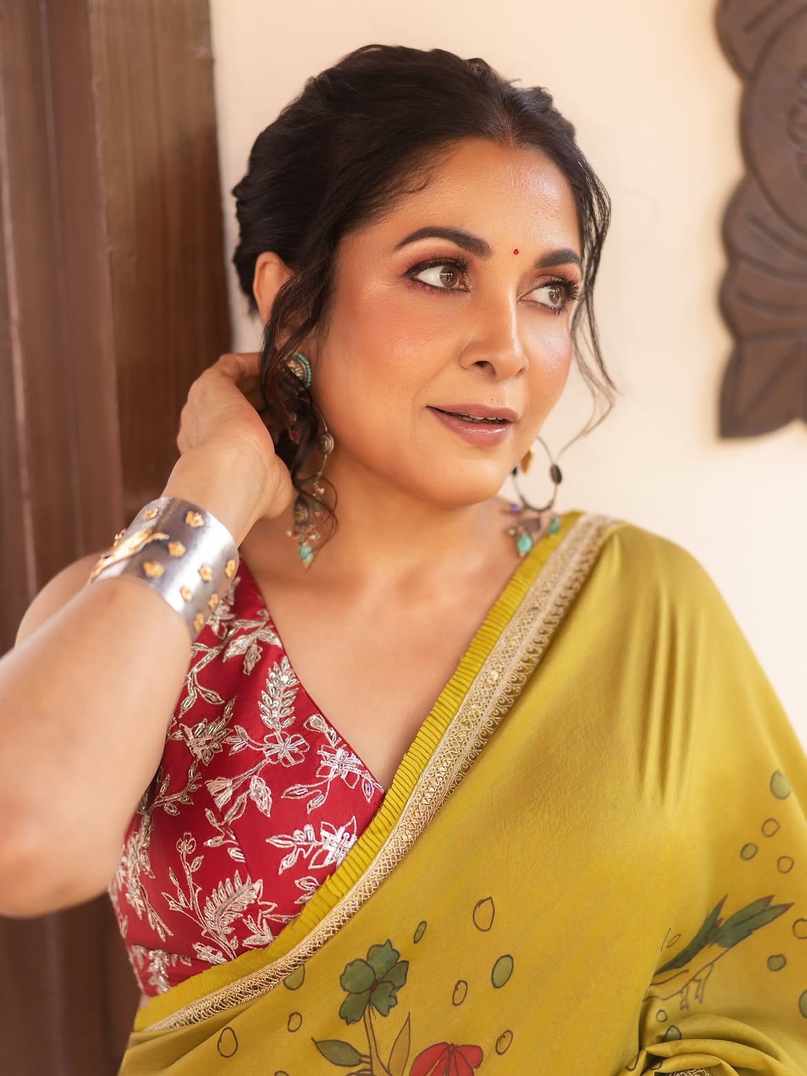 Ramya Krishnan Looks Elegant in a Mustard Yellow Saree