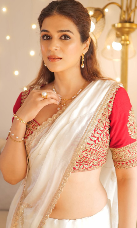 Shraddha Das Stuns in a Classic White Saree and Red Blouse