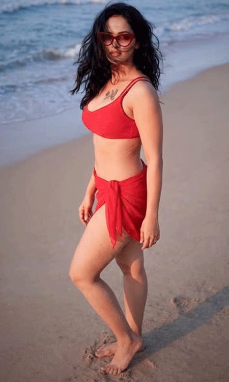 Jyoti Poorvaj Turns Up the Heat in a Bold Crimson Beach Look