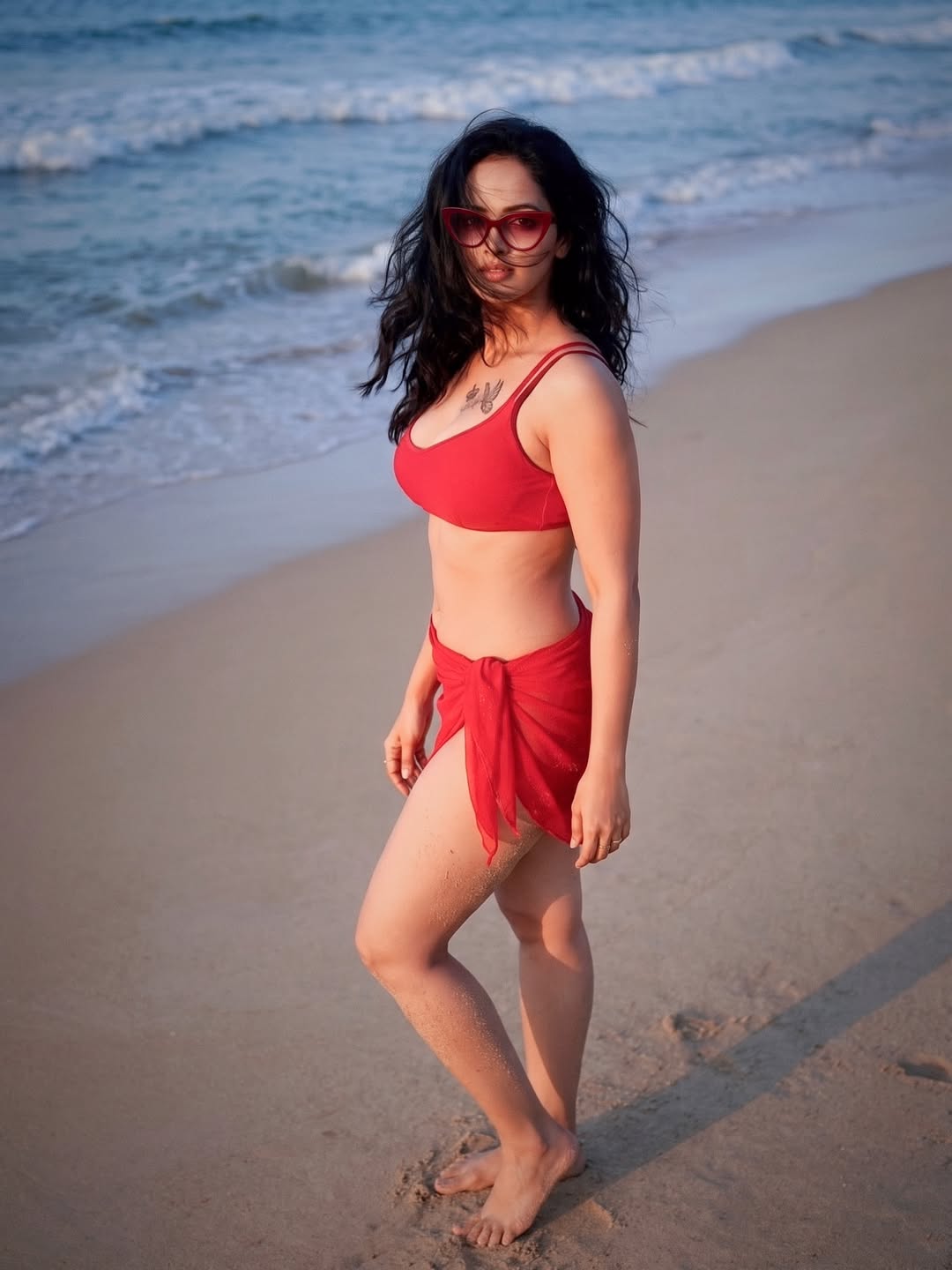 Jyoti Poorvaj Turns Up the Heat in a Bold Crimson Beach Look