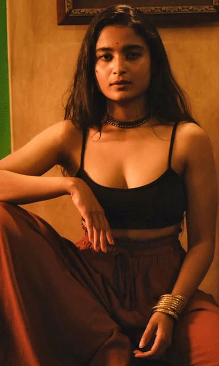 Chaithra J Achar Stuns in a Chic Black Top and Terracotta Trousers