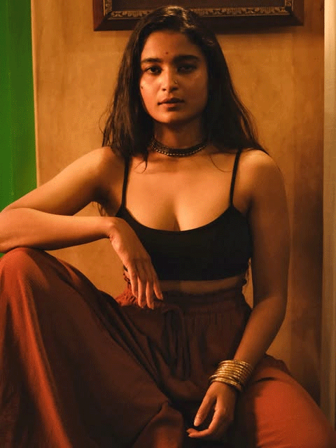 Chaithra J Achar Stuns in a Chic Black Top and Terracotta Trousers