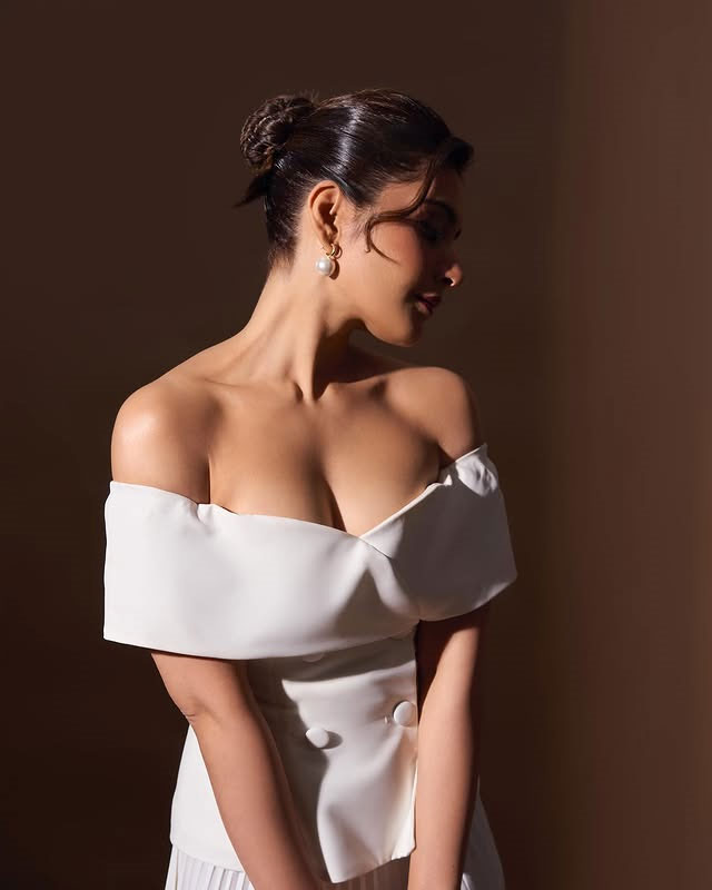 Raashii Khanna Stuns in Elegant White Off-Shoulder Blazer Look