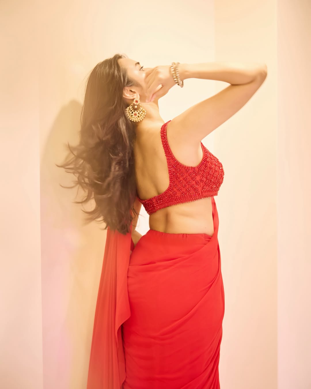 Nuveksha Stuns in Red Saree With Elegant Traditional Look