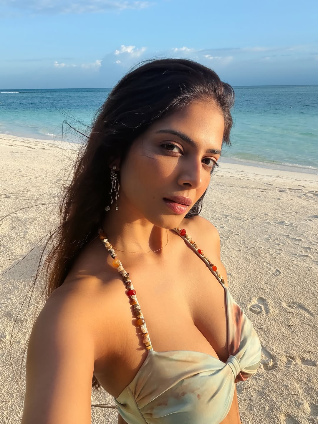 Malavika Mohanan Stuns in Pastel Bikini During Beachside Photoshoot