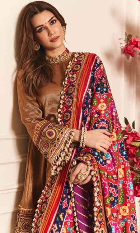 Kriti Sanon Looks Regal in a Golden-Brown Silk Kurta and Patola Dupatta
