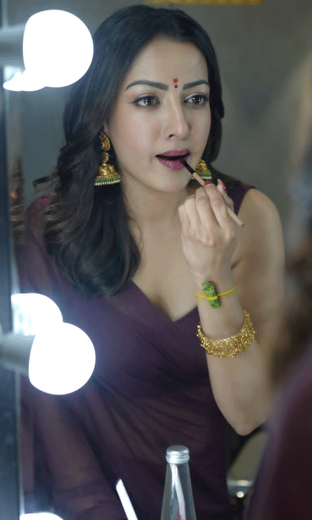 Catherine Tresa Stuns in Traditional Maroon Saree for Karikaala