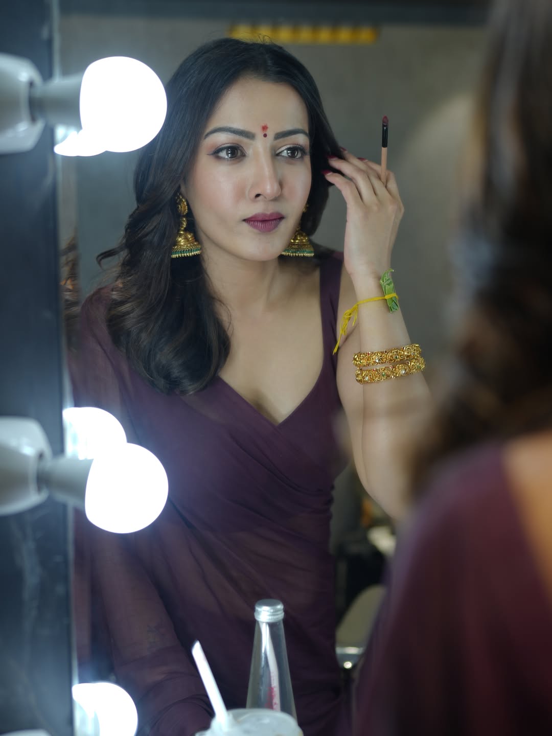 Catherine Tresa Stuns in Traditional Maroon Saree for Karikaala