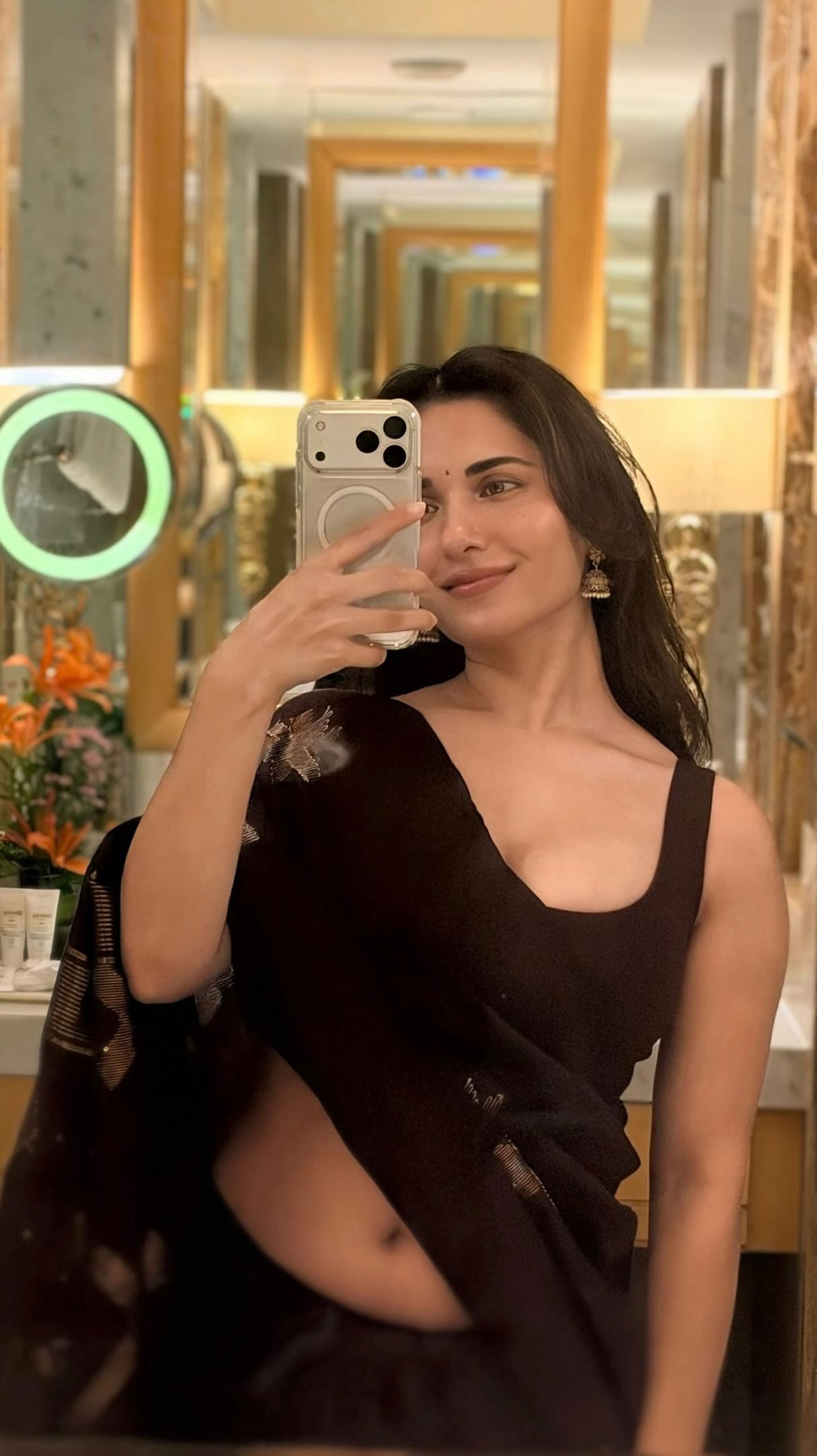 Ruhani Sharma Looks Elegant in a Black Saree Mirror Selfie