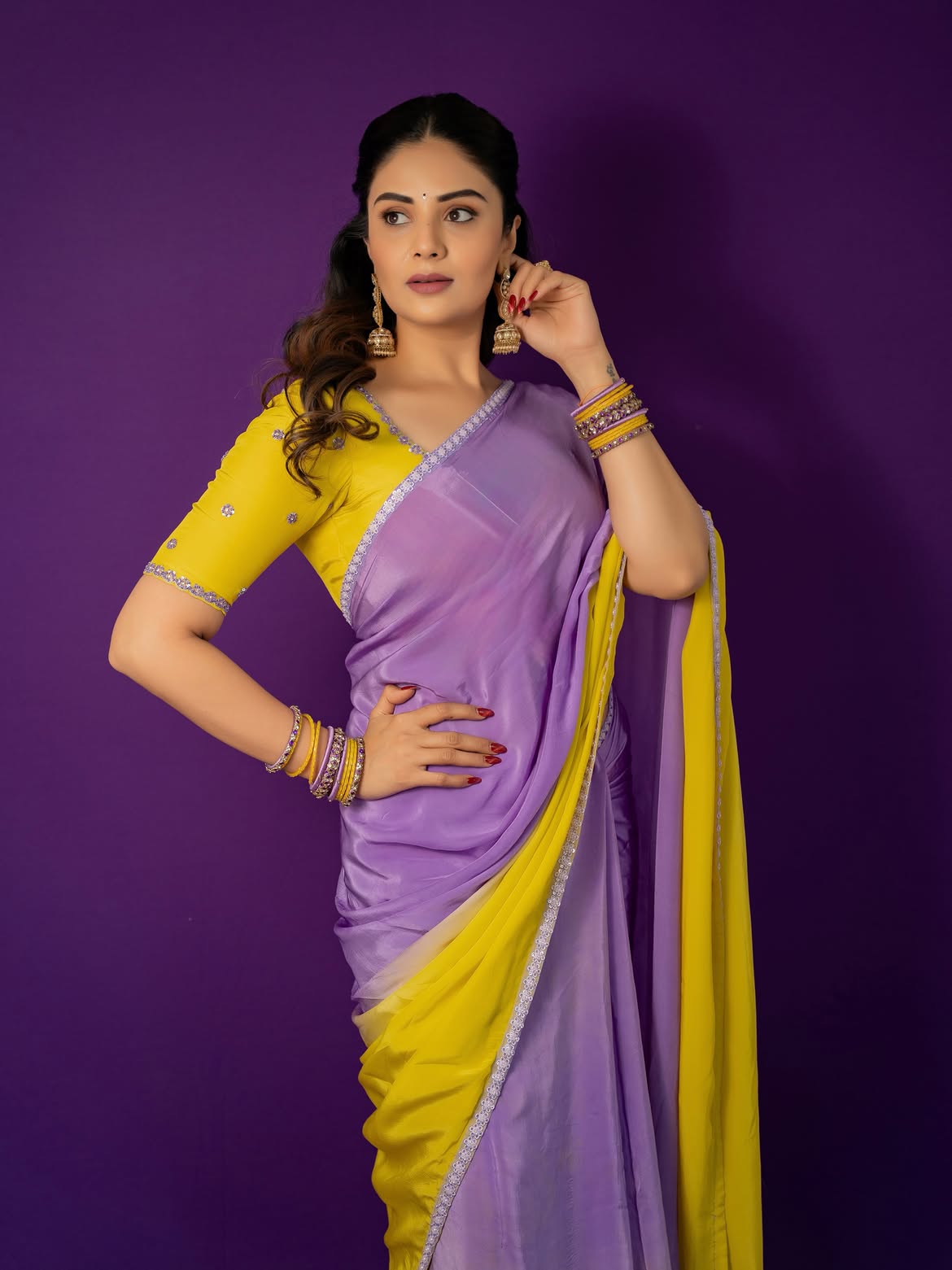 Sreemukhi Looks Gorgeous in Yellow Lavender Saree
