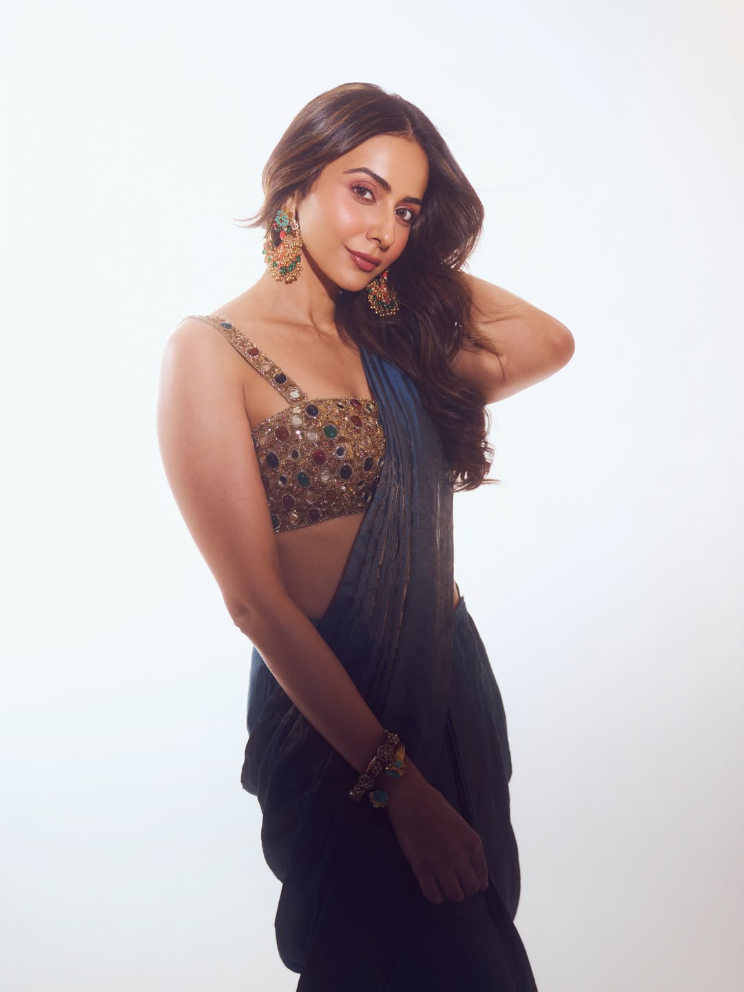 Rakul Preet Singh Stuns in Metallic Teal Saree at Ramayana Event