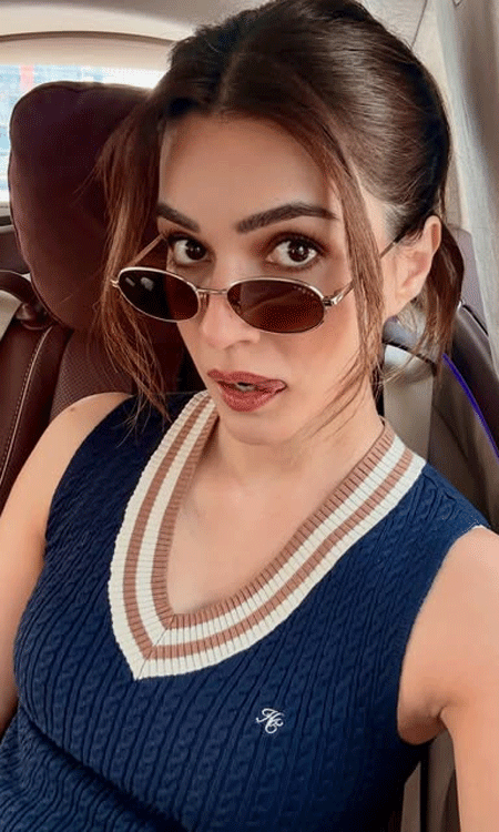 Kriti Sanon Looks Chic in Navy Knit Top and Retro Sunglasses