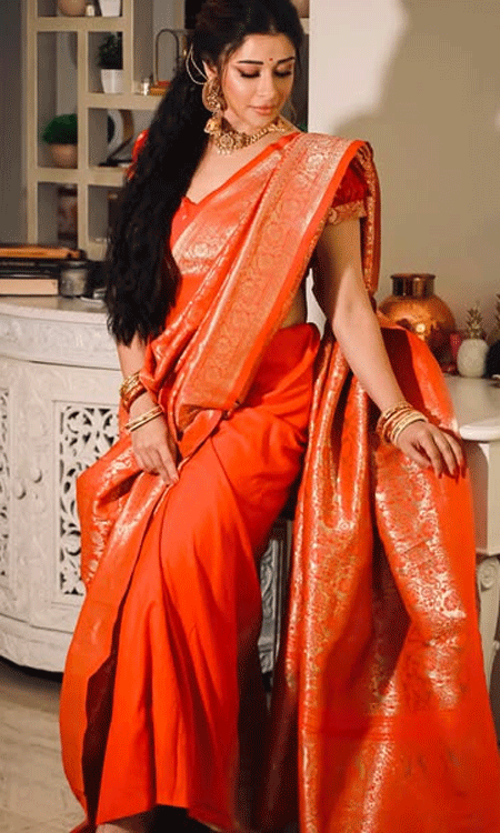 Nyra Banerjee Radiates Festive Elegance in Orange Banarasi Silk Saree
