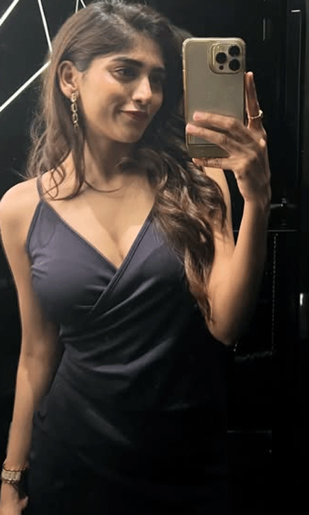 Chandini Chowdary Stuns in a Chic Charcoal Dress in Mirror Selfie
