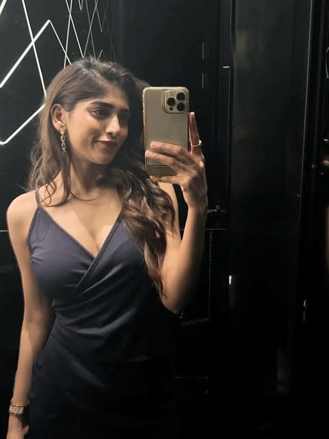 Chandini Chowdary Stuns in a Chic Charcoal Dress in Mirror Selfie