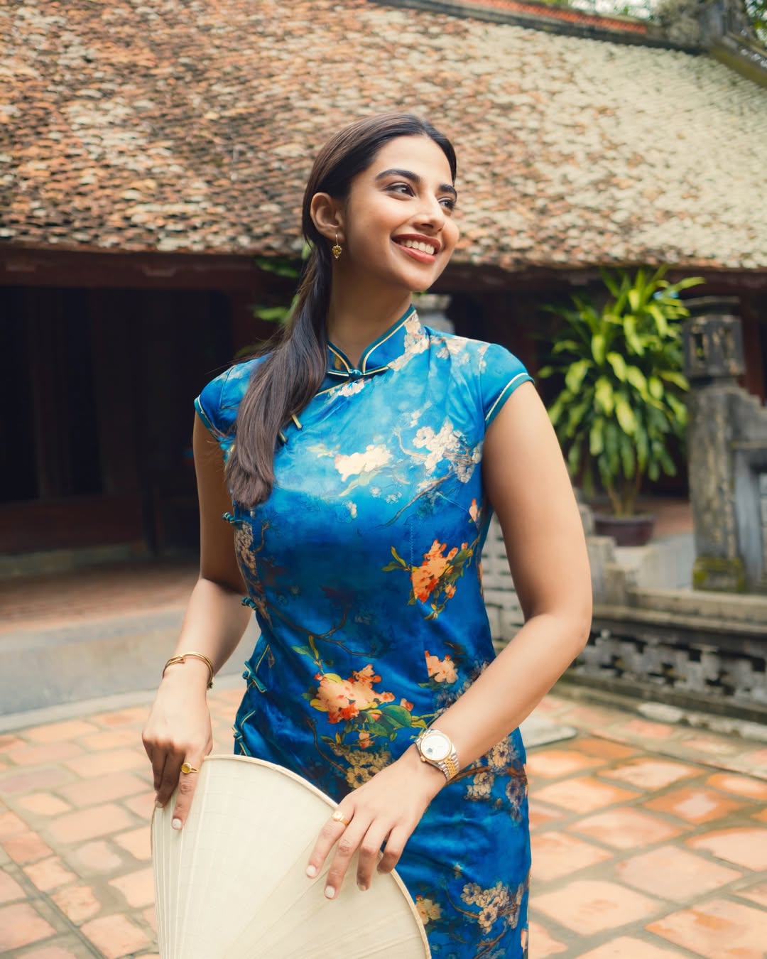 Meenakshi Chaudhary Stuns in a Blue Floral Dress During Vietnam Trip