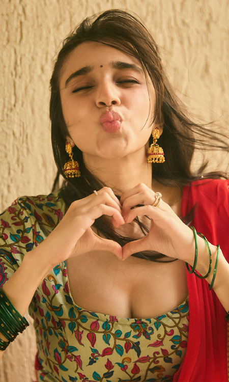 Nuveksha Stuns in a Colourful Red Saree and Mint Green Blouse