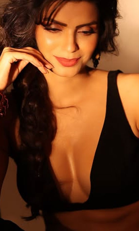 Sonali Raut Looks Glamorous in a Chic Black Deep-V Top