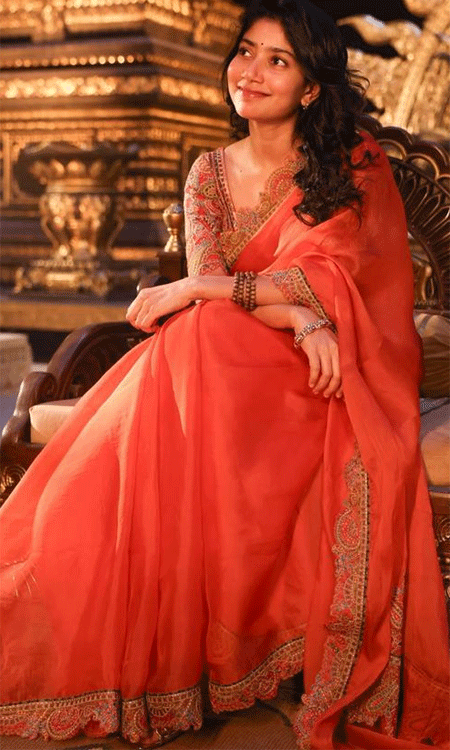 Sai Pallavi Looks Royal in a Stunning Coral-Red Saree