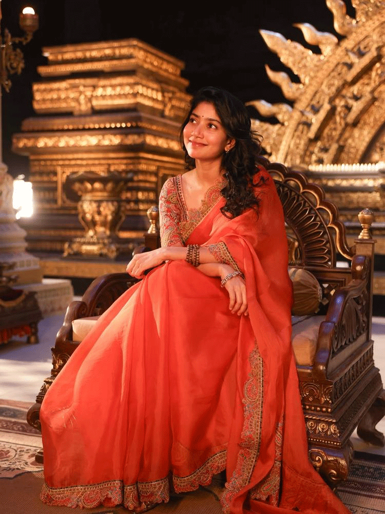 Sai Pallavi Looks Royal in a Stunning Coral-Red Saree