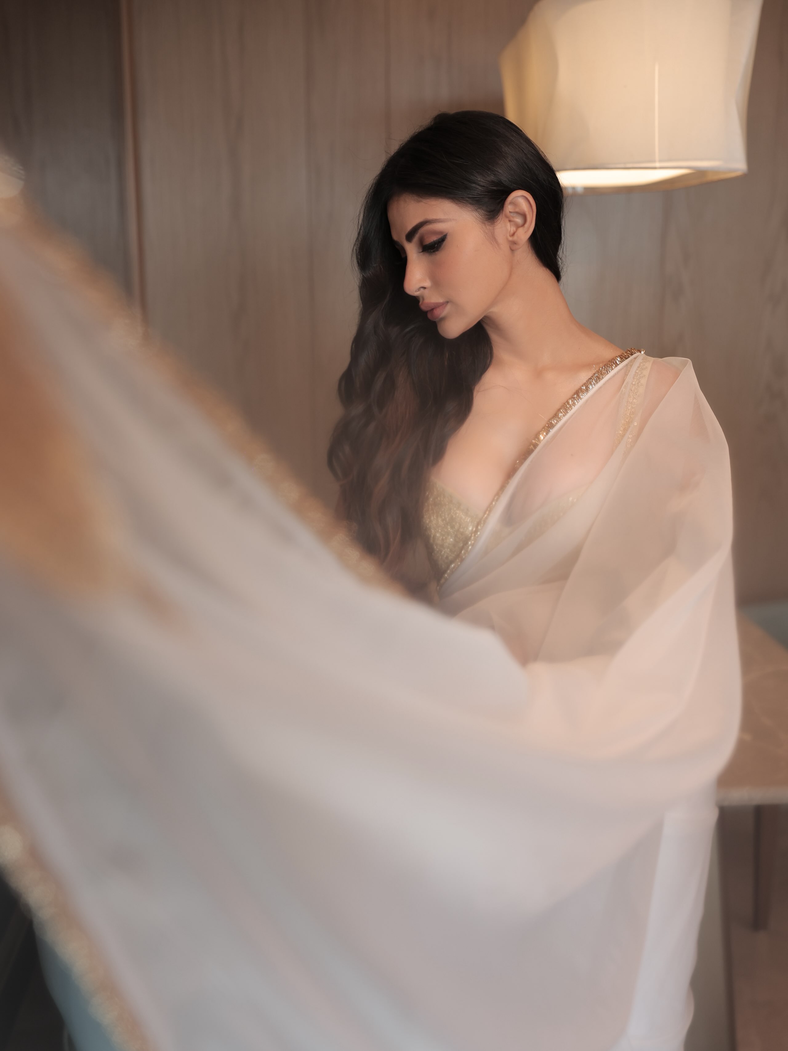 Mouni Roy Flaunts Timeless Grace in a White and Gold Saree