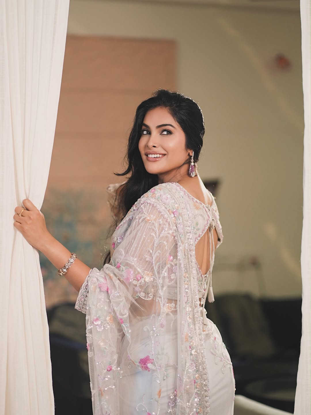 Divi Vadthya Looks Elegant in a Sheer White Floral Saree