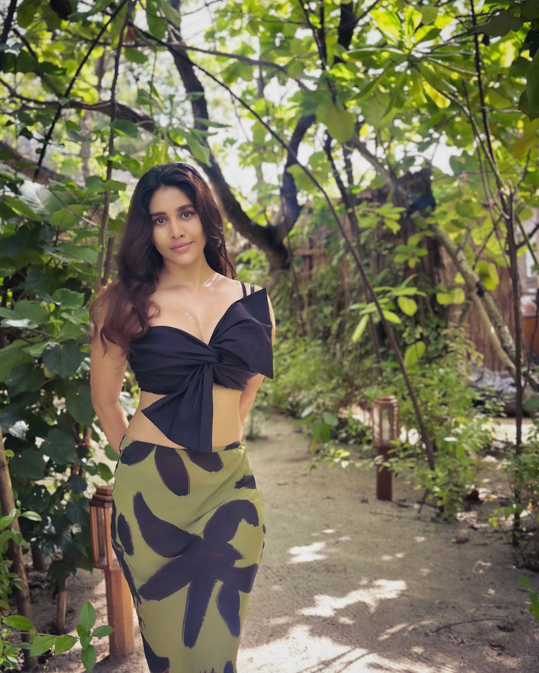 Nabha Natesh Looks Chic in a Black Crop Top and Floral Olive Skirt
