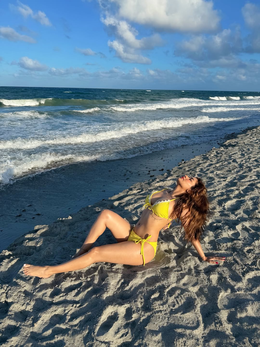 Avneet Kaur Turns Up the Heat in a Yellow Lace-Trimmed Beach Look