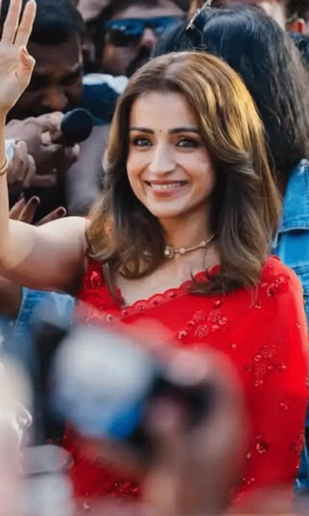 Trisha Krishnan Stuns in a Crimson Red Embroidered Saree