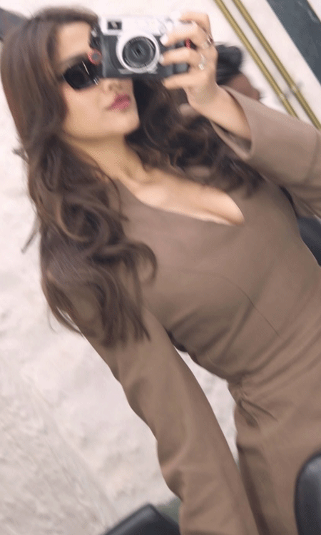 Saiee M Manjrekar Rocks a Stylish Look With a Vintage Camera