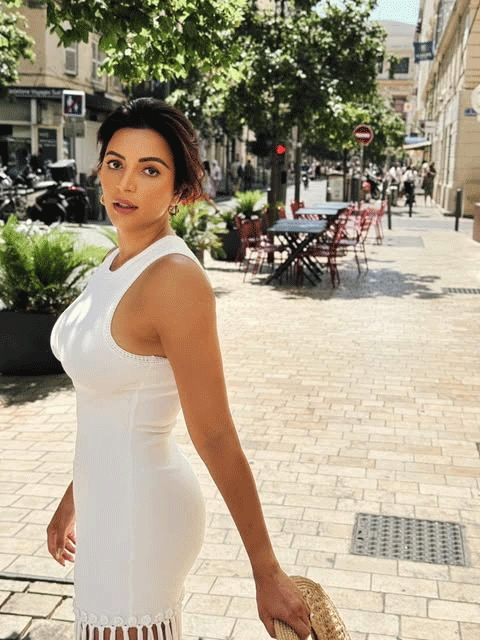 Shama Sikander Stuns in a White Fringed Dress on European Streets