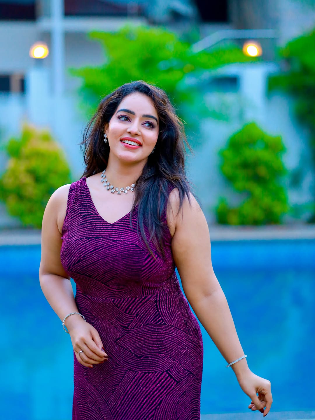 Malavika C Menon Adds Floral Charm to Her Chic Magenta Outfit