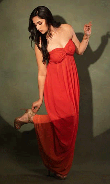 Rukmini Vasanth Stuns in a Flowing Coral Strapless Gown